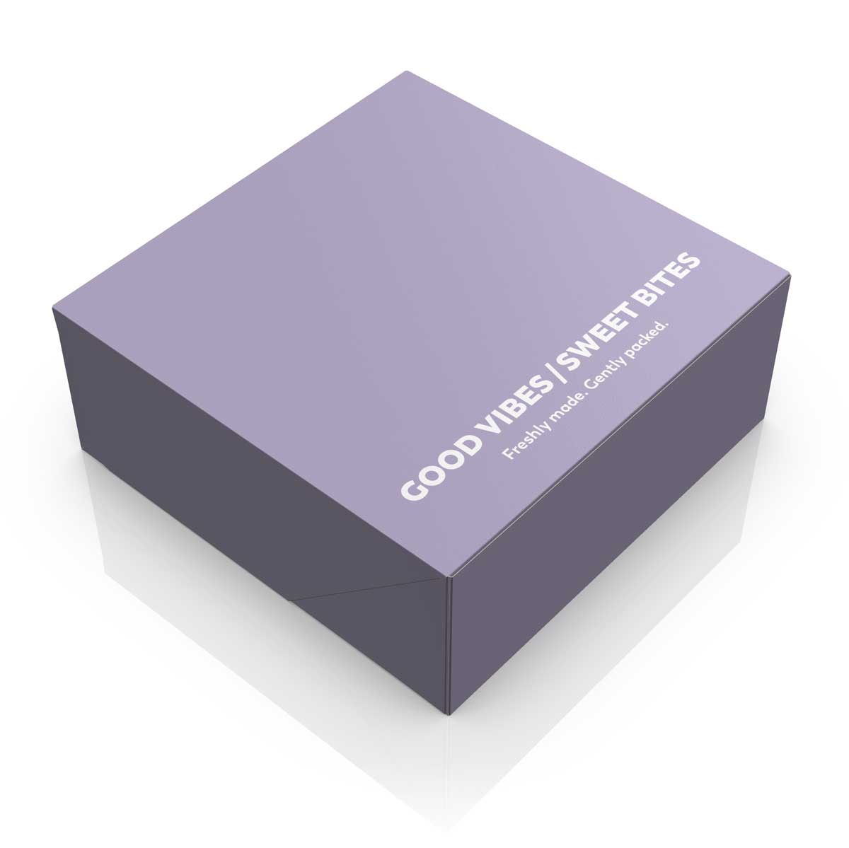 Lilac pastry box design with die cut, typographic message and soft pastel colors. NO IDEA Branding Graphic Design Agency