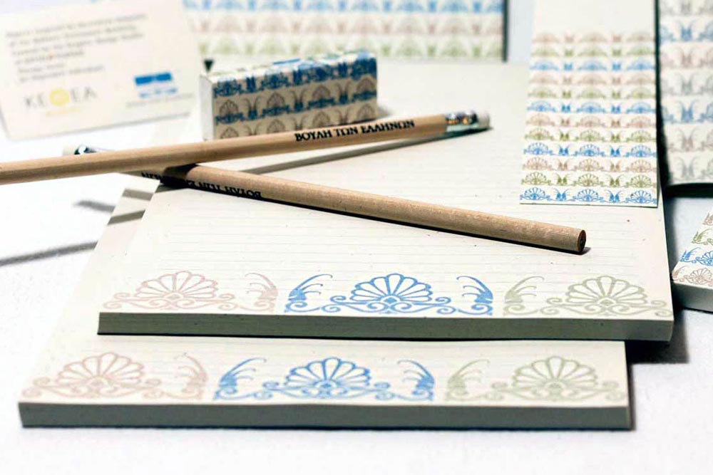 Notebook design with architectural patterns inspired by neoclassical building elements. NO IDEA. Branding Graphic Design Agency.