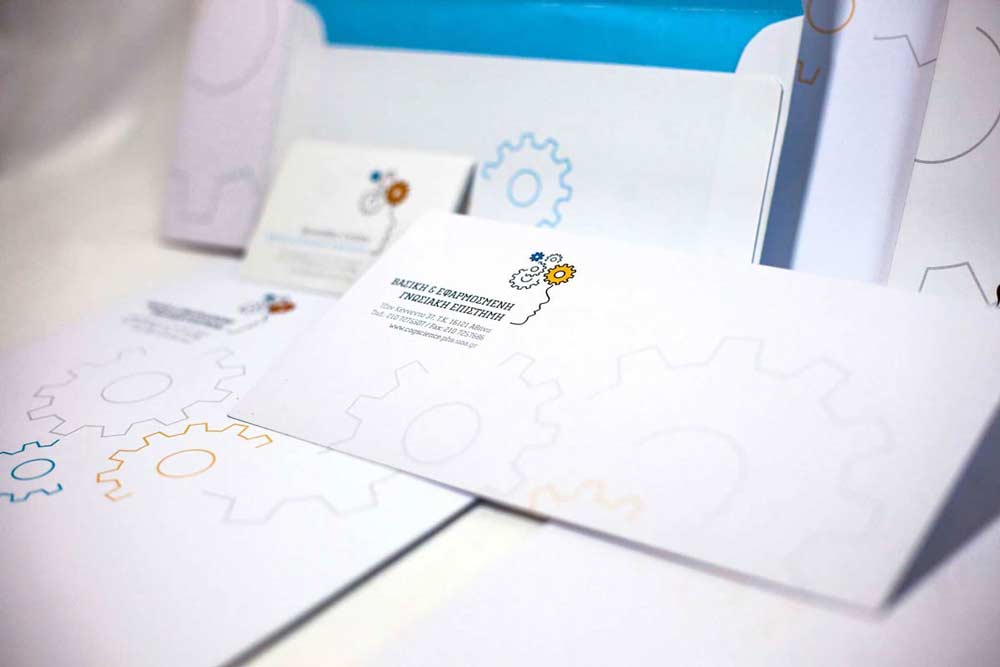 Letterhead and envelope design for university program featuring corporate color palette and unified branding. NO IDEA. Branding Graphic Design Agency.